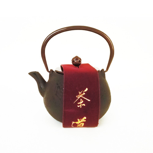 a small jade iron kettle
