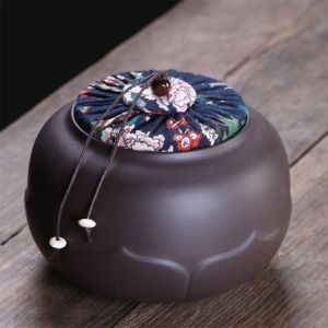 a lotus-patterned tea canister